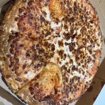 MrJims.Pizza - Not extra cheese and some pieces hardly any at all. No one at those. Overbaked. - Pizza Near Me - Aledo, Texas