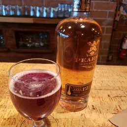 A glass of Sang Bleu next to my purchase A glass of Sang Bleu next to my purchase