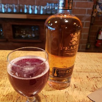 Craft Wine & Beer - A glass of Sang Bleu next to my purchase - Beer, Wine & Spirits Near Me - Reno, Nevada Craft Wine & Beer - A glass of Sang Bleu next to my purchase - Beer, Wine & Spirits Near Me - Reno, Nevada