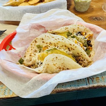 Poppo's Taqueria - three tacos in a basket - Mexican Near Me - Bradenton, Florida Poppo's Taqueria - three tacos in a basket - Mexican Near Me - Bradenton, Florida