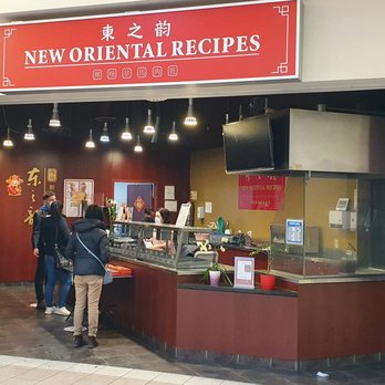 New Oriental Recipes - two people standing in front of a counter - Singaporean Near Me - Markham, Ontario New Oriental Recipes - two people standing in front of a counter - Singaporean Near Me - Markham, Ontario