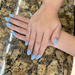 TN Nails - Nancy was helpful in helping my daughter's nail design come to life. They turned out perfectly.