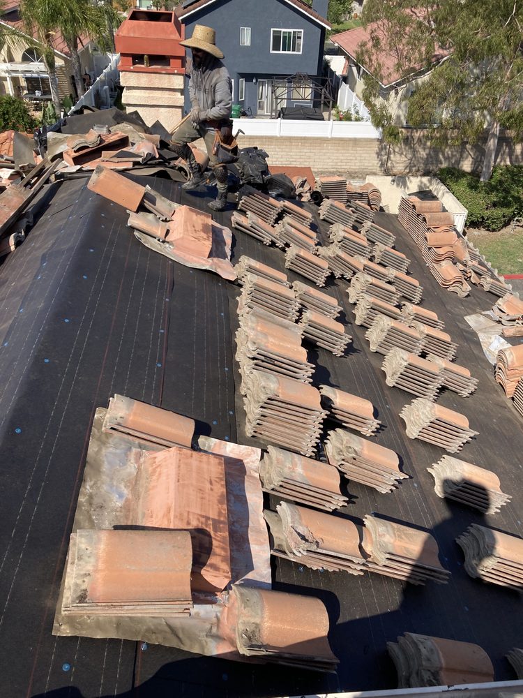 Slide of Green Ladder Roofing