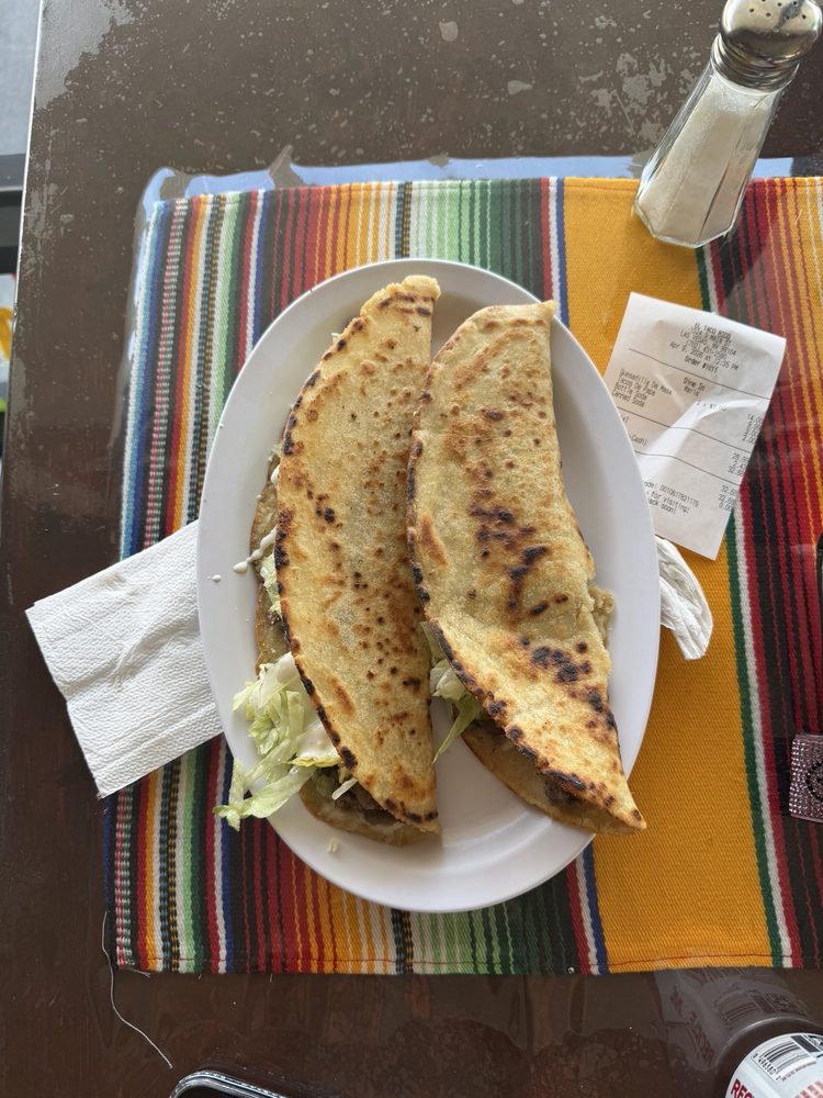 Taco rico Logo