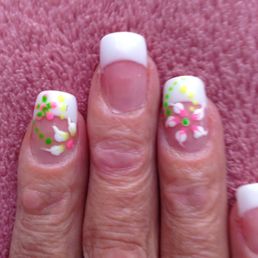My nail lady always paints a design on my nails. My nail lady always paints a design on my nails.