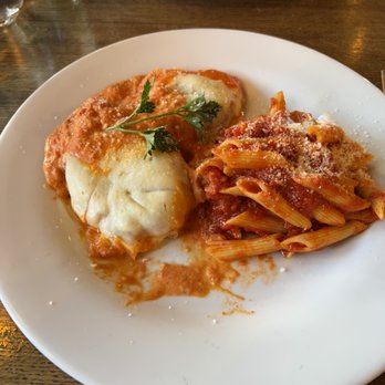 Spago Trattoria E Pizzeria - Chicken with prosciutto and a side of pasta. - Italian Near Me - Windsor, Ontario Spago Trattoria E Pizzeria - Chicken with prosciutto and a side of pasta. - Italian Near Me - Windsor, Ontario