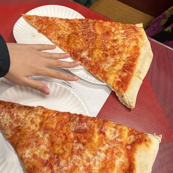 Benny Tudino's - Hand for comparison - Pizza Near Me - Hoboken, New Jersey