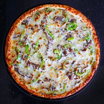 Villages Pizza - a pizza with cheese and vegetables - Pizza Near Me - Calgary, Alberta