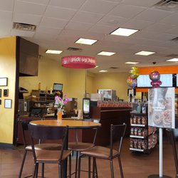 Dining area  with sandwich pick up station in background