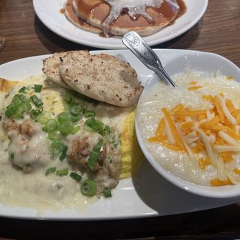 Another Broken Egg Cafe - The Floridian Omelette with grits and English muffin - Breakfast & Brunch Near Me - Austin, Texas Another Broken Egg Cafe - The Floridian Omelette with grits and English muffin - Breakfast & Brunch Near Me - Austin, Texas