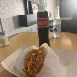 Chorizo burrito with scrambled eggs and a real Coke! Chorizo burrito with scrambled eggs and a real Coke!