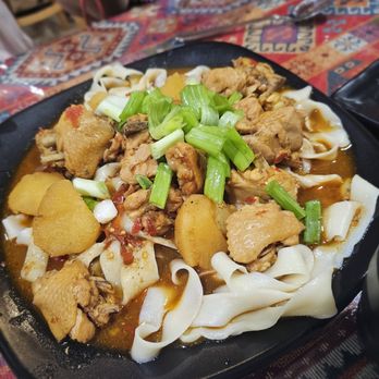 New Nurlan Restaurant - DaPanJi/Big Plate Chicken. Small size for $25.50. Excellent. Best of the mains - Soup Near Me - Flushing, New York