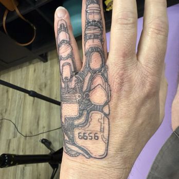 Jurassic Ink Tattoo - My anniversary tattoo 2026 - Tattoo Near Me - Kent, Washington