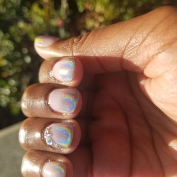 File + Style - Holographic gradient tips with rhinestones on the ring finger - Nail Salons Near Me - Oakland, California File + Style - Holographic gradient tips with rhinestones on the ring finger - Nail Salons Near Me - Oakland, California