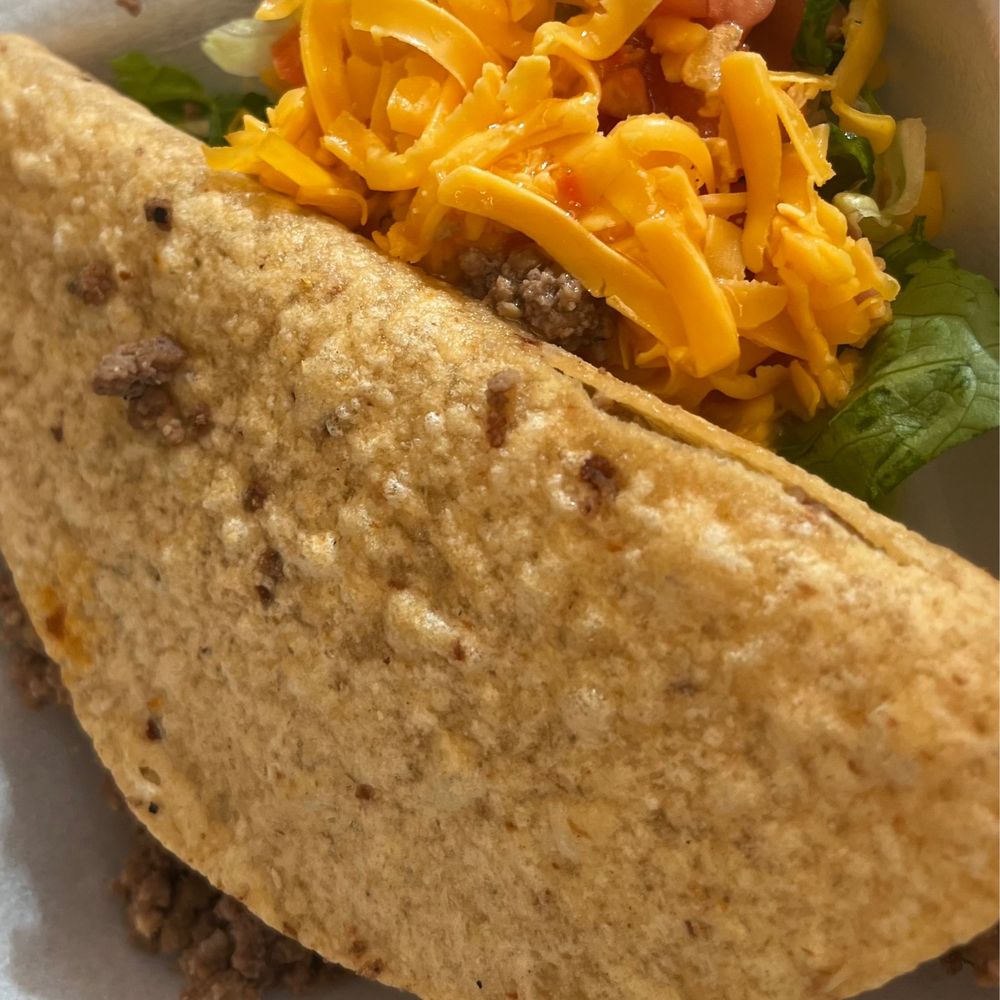 Beef taco served with L,T and cheese