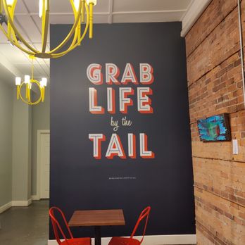 BeaverTails - a sign that says grab life by the tail - Desserts Near Me - Huntsville, Ontario