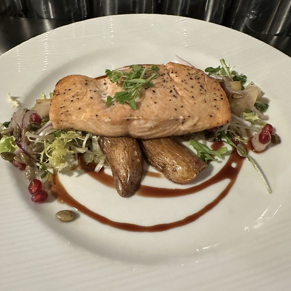 Albert's Restaurant - Salmon entree with fingerling potatoes and frisée salad. - American Near Me - San Diego, California Albert's Restaurant - Salmon entree with fingerling potatoes and frisée salad. - American Near Me - San Diego, California