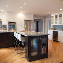 Express Kitchens - Wall Cabinets: Star Cabinetry Mero (White Shaker) Island: Star Cabinetry Dublin (Espresso Shaker) Countertops: Star Stone Tiger Skin White