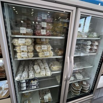 The Baker's Son By Valerio's - The cakes and goods they keep cold! My two faves are on the top left - mocha roll and red velvet roll! - Bakeries Near Me - Jacksonville, Florida