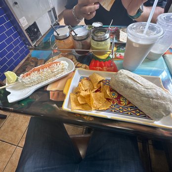 El Caracol Mexican Grill - 10. Bean Burrito, orchata , Street Corn Elote and an assortment of spicy sauces. - Mexican Near Me - Philadelphia, Pennsylvania El Caracol Mexican Grill - 10. Bean Burrito, orchata , Street Corn Elote and an assortment of spicy sauces. - Mexican Near Me - Philadelphia, Pennsylvania