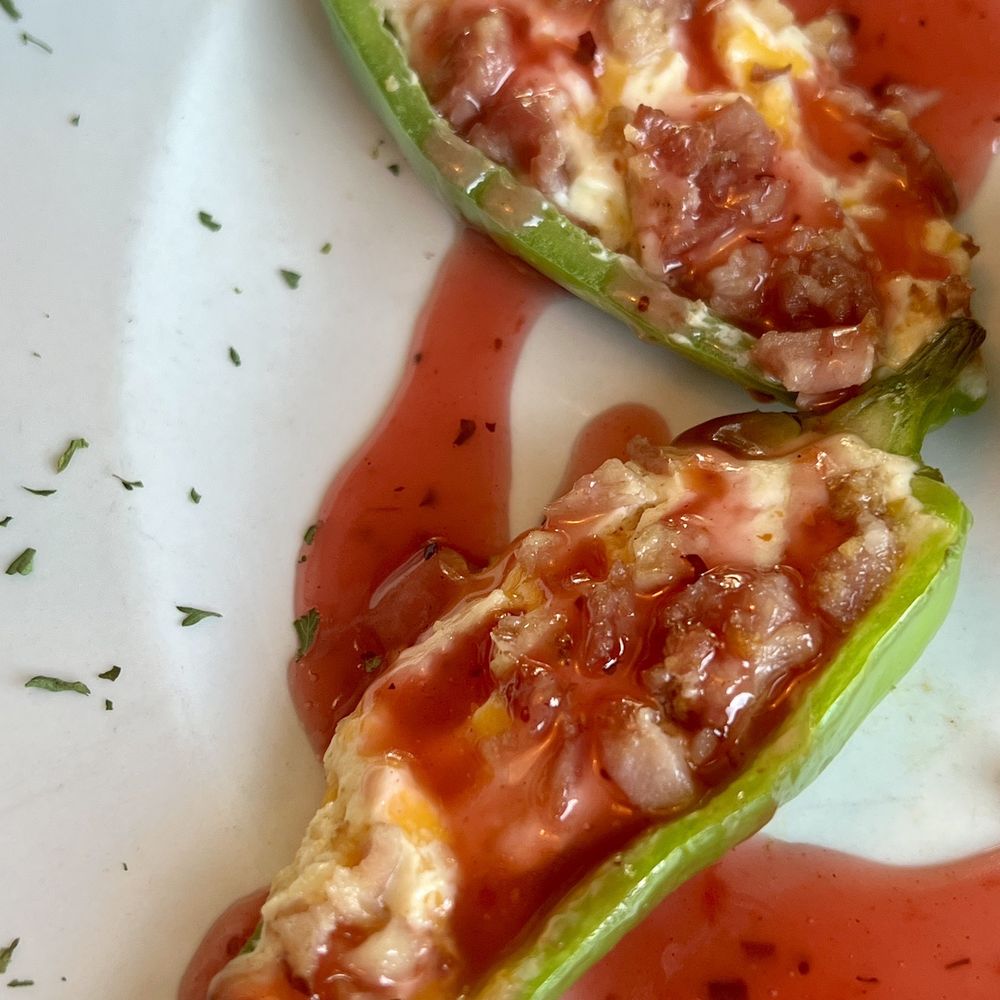 Jalapeño poppers with raspberry sauce. Jalapeño poppers with raspberry sauce.
