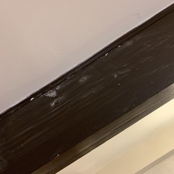 C&C Handyman Services - Wood beam in dining area covered in paint and scratched. - Handyman Near Me - Manassas, Virginia