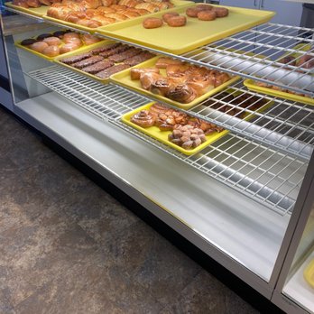 Daylight Donuts - a display case with trays of donuts - Donuts Near Me - Oklahoma City, Oklahoma Daylight Donuts - a display case with trays of donuts - Donuts Near Me - Oklahoma City, Oklahoma