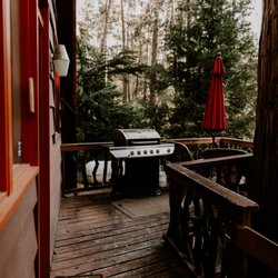 Idyllcreek A-Frame Vacation Cabin - The back patio is perfect for grilling, hanging, and stargazing.
