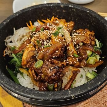 K Food - Stone wok rice with squid and pig stomach - Korean Near Me - Edison, New Jersey K Food - Stone wok rice with squid and pig stomach - Korean Near Me - Edison, New Jersey