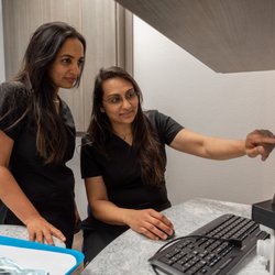 Pleasant Run Family Dental - The Pleasant Run Family Dental dentists, Dr. Setti and Dr. Patel discussing an xray