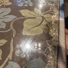 This place is disgustingly dirty. Look under the glass on this "clean" table!! So so gross. All the tables look this way.