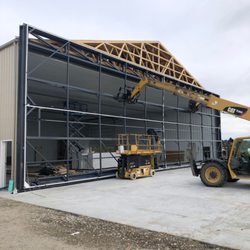 A-One Garage Door - Let our team help you with your project. We can handle the smallest repair to the largest installation!