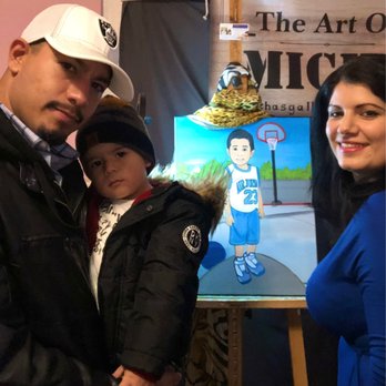 Micha's Gallery International - Myself, my son and Micha. His painting done by her in the back. - Art Galleries Near Me Micha's Gallery International - Myself, my son and Micha. His painting done by her in the back. - Art Galleries Near Me
