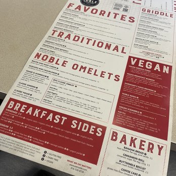 Noble Restaurant - a menu and a purse on a table - Breakfast & Brunch Near Me - Wyoming, Michigan Noble Restaurant - a menu and a purse on a table - Breakfast & Brunch Near Me - Wyoming, Michigan