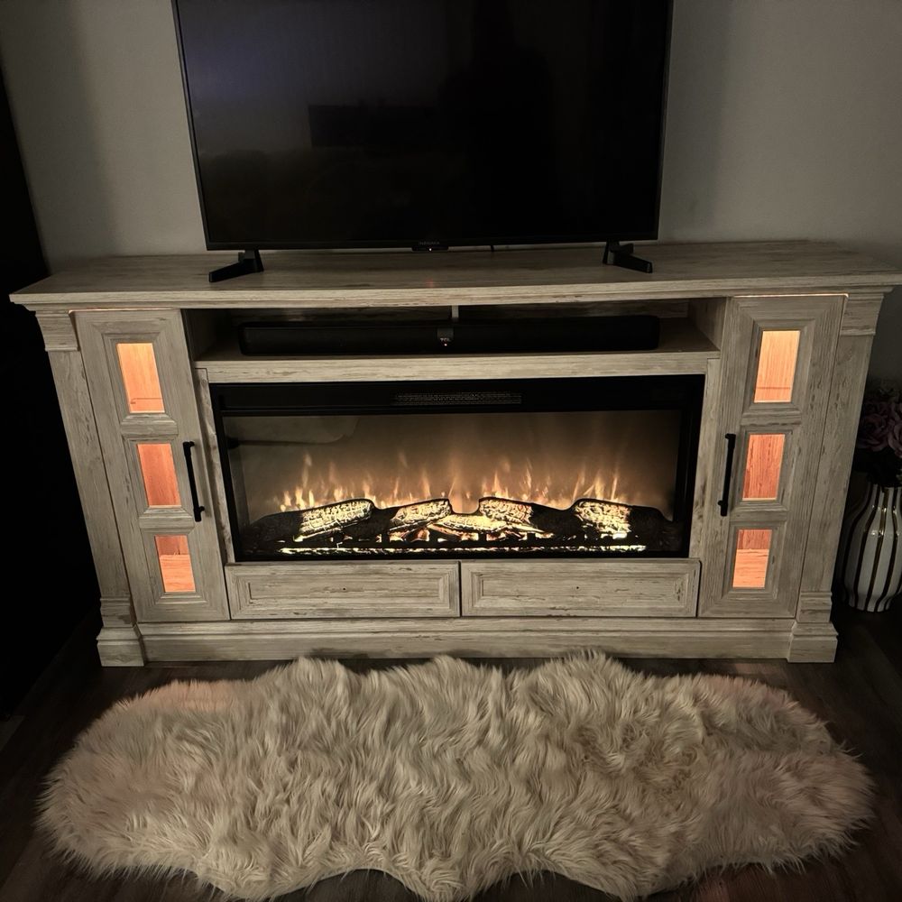 ABC Home Repairs - TV stand with built in fireplace. - Handyman Near Me