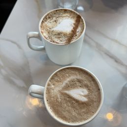 Top- latte with honey and cinnamon. Bottom- mocha
