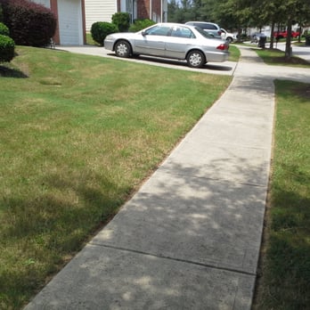 Community Lawncare Services Inc - a car parked on the sidewalk - Landscaping Near Me Community Lawncare Services Inc - a car parked on the sidewalk - Landscaping Near Me