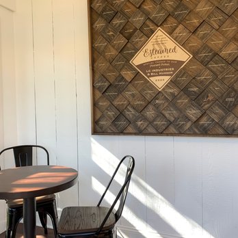 Esteamed Coffee - a table and chairs in a coffee shop - Coffee & Tea Near Me - Cary, North Carolina Esteamed Coffee - a table and chairs in a coffee shop - Coffee & Tea Near Me - Cary, North Carolina