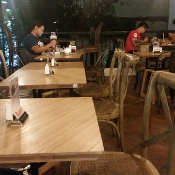 Tambayan Capsule Hostel - Well aligned seating plan and open dining space. - Hostels Near Me - Malate, NCR