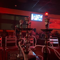 a group of hookahs in a restaurant a group of hookahs in a restaurant