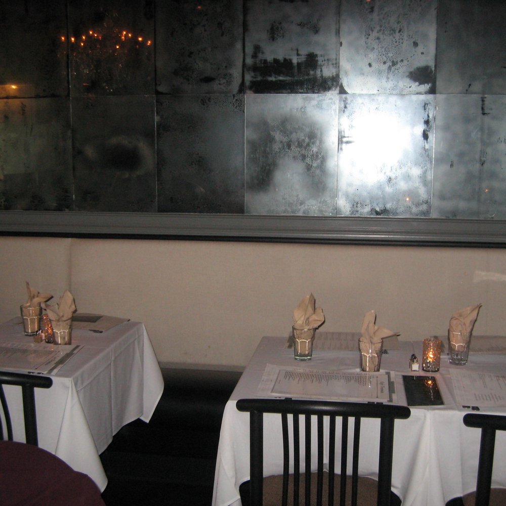 Cafe Tiramisu - two tables with napkins on them - Italian Near Me - Raleigh, North Carolina Cafe Tiramisu - two tables with napkins on them - Italian Near Me - Raleigh, North Carolina