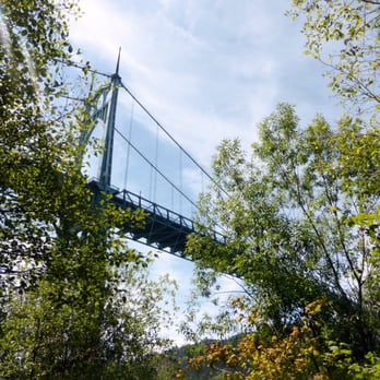 Cathedral Park - View of the St. Johns Bridge on a beautiful summer day. - Parks Near Me - Portland, Oregon Cathedral Park - View of the St. Johns Bridge on a beautiful summer day. - Parks Near Me - Portland, Oregon