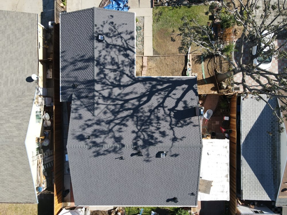 Slide of Real Roofing