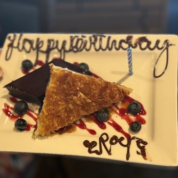 Roy's Ko Olina - Birthday dessert - I think coconut bar and a flourless choc cake? - Asian Fusion Near Me - Kapolei, Hawaii Roy's Ko Olina - Birthday dessert - I think coconut bar and a flourless choc cake? - Asian Fusion Near Me - Kapolei, Hawaii