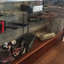 A Little Bit of Everything - Knives and womans purses.