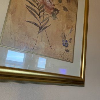 Quality Inn - Pictures with dried liquid drips on glass and frames. - Hotels Near Me - Trinidad, Colorado