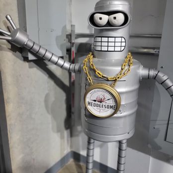 Meddlesome Brewing company - a robot with a chain around its neck - Breweries Near Me - Cordova, Tennessee
