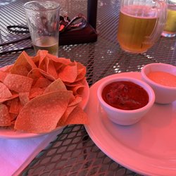 Wildhawk Grille - Chips, salsa and queso. Along with a pitcher of beer.