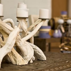 MACK Home - natural, beachy bleached coastal driftwood candle holder; antique carved wooden coffee table; orchid artisan decorative candles