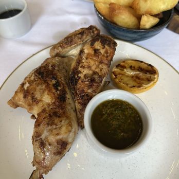 Santa Maria del Sur - Half chicken with sauce - Steakhouses Near Me - London, XGL Santa Maria del Sur - Half chicken with sauce - Steakhouses Near Me - London, XGL